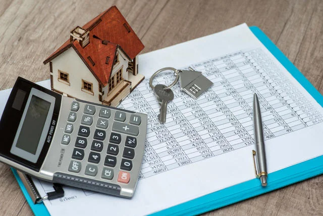 can you buy a house on a work permit in canada?