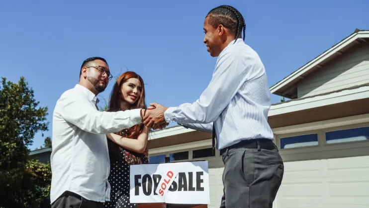 can you buy a house on a work permit in canada?